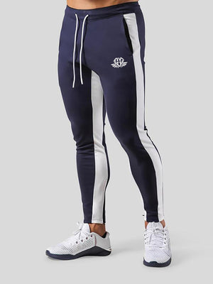 Man wearing ANVTT heather grey side stripe tapered jogger pants